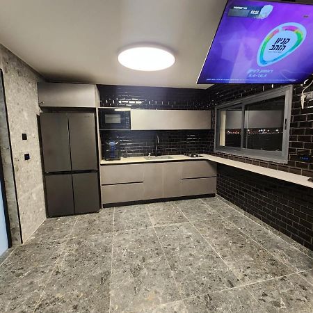 מבנים בים 75 Suites At Sea Haifa Exterior foto